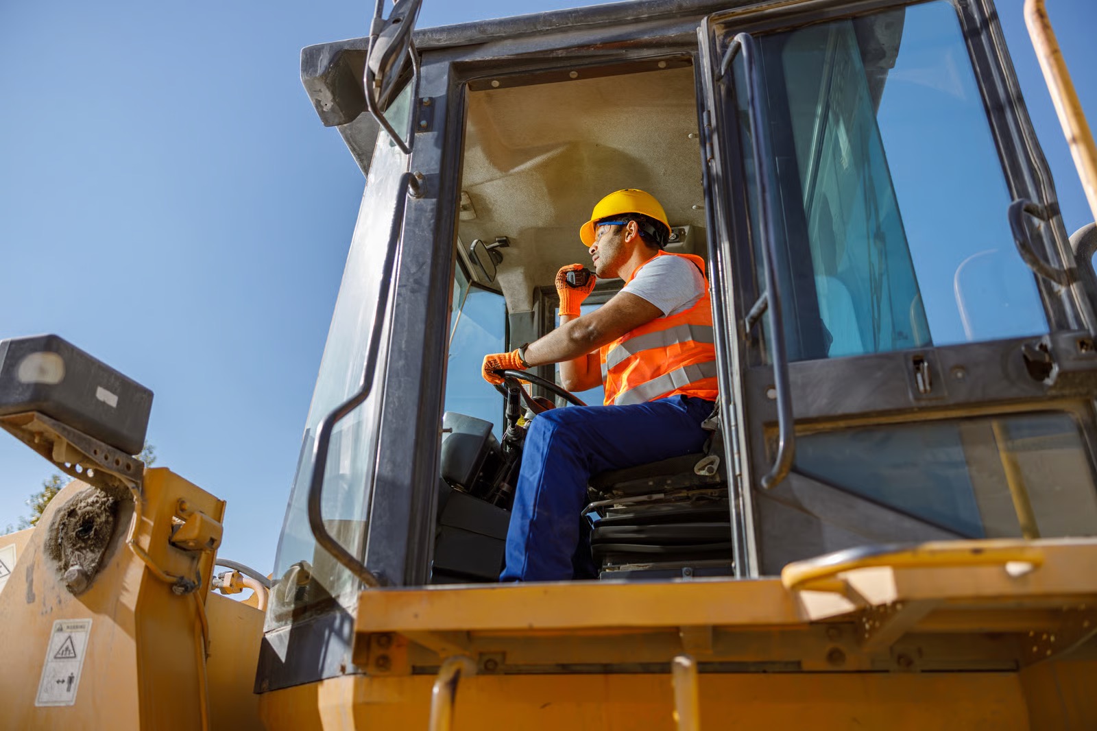 A senior equipment operator filmed once for the standard course